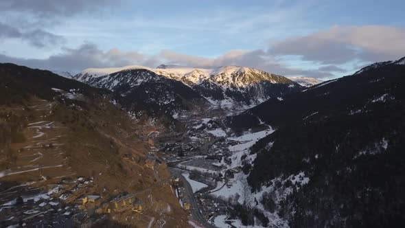 Drone traveling through the Tarter valley in Andorra with the last lights of the day.