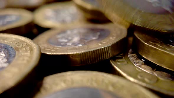 british pound coins. Multiple pound coins display.