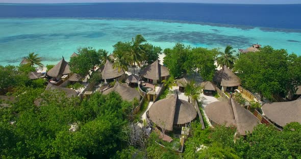 Aerial drone view of a couple at a spa resort hotel.