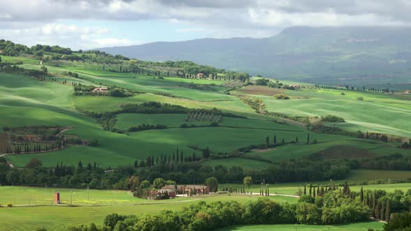 Shadows of Clouds Slide on Hills of Tuscany, Italy