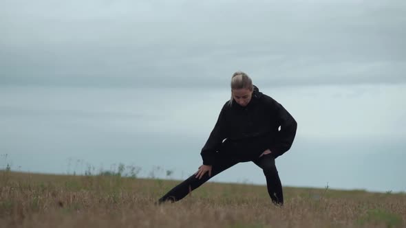 Slowmotions Sport Female Walking in a Field