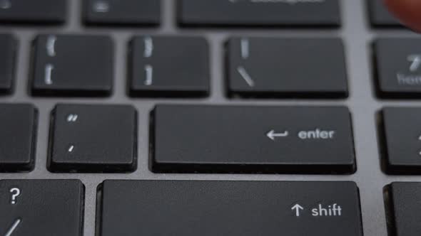 Enter Button Pressing on Keyboard Laptop Keyboard Close Up