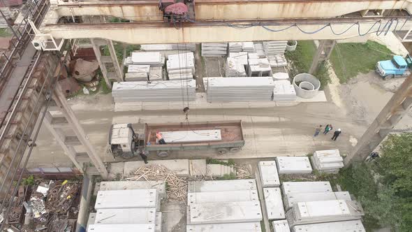 Aerial of an overhead crane at a precast plant