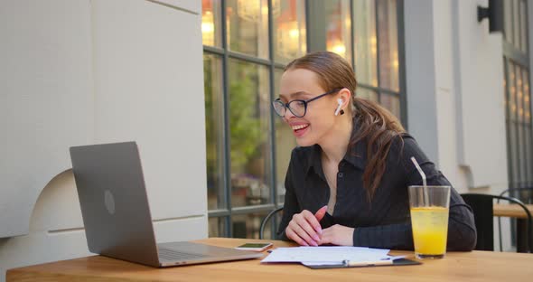 The Businesswoman Is Happily Responding To the Video Call