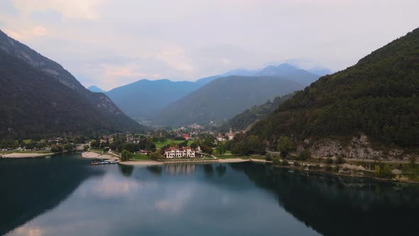 Fantastic shot of a divine beauty lake ledro and lovely, tucked in settlement at the foot of the mou