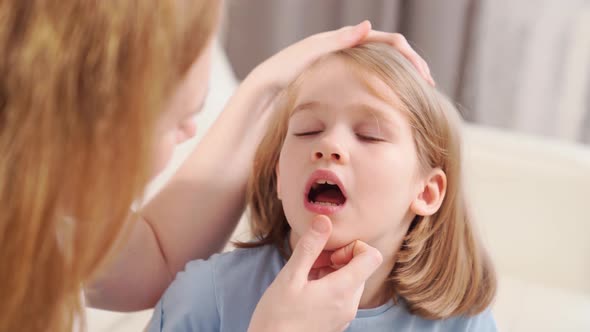 Little Girl Shows Mother Reeling Tooth