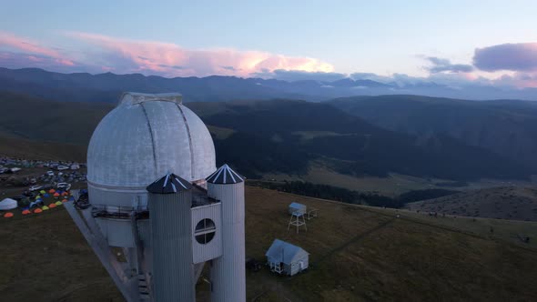 Two Large Telescope Domes at Sunset