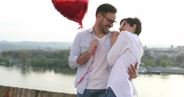 Young Couple in Love Dating and Smiling Outdoor