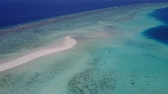 Aerial view panorama of seashore beach by blue sea with sand background