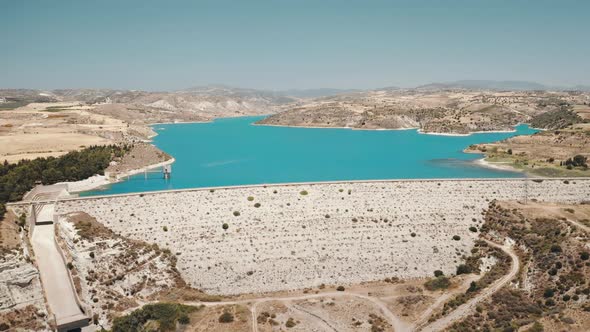 Dam Water Storage Reservoir in Dry Desert Mountain Countryside of Cyprus