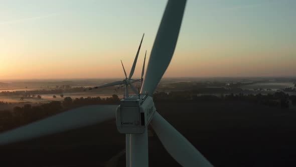 Aerial View of Wind Turbine Eco Farm at Beautiful Sunrise