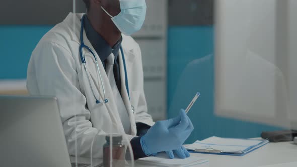 Close Up of Young Doctor Talking to Patient About Healthcare