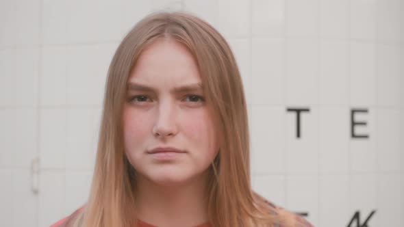 Portrait of Young Woman Warning with Gesture, Saying No