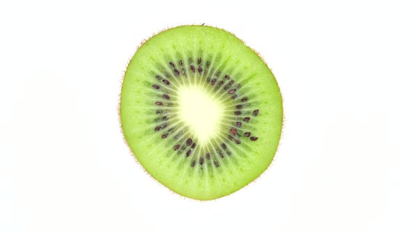 Kiwi fruit isolated on white background, rotate. 4K UHD video