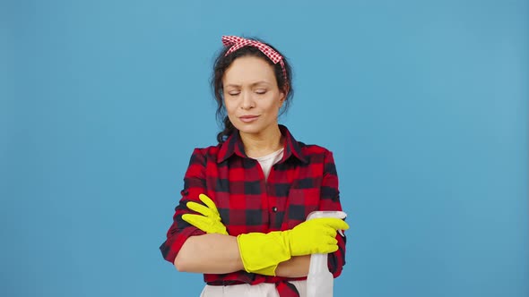 Confident Housewife Spraying with Detergent Aside at Dirty Spot Posing to Camera with Crossed Hands