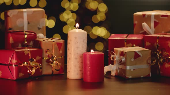 Christmas Candle Light Burning Against Blurred Background