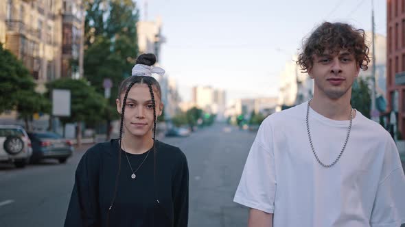 Couple of Dancers Smiles at Each Other and Walks Together