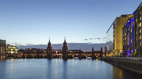 Day to Night Time Lapse of Oberbaum Bridge with Spree River, Berlin, Germany