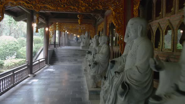 Row Of Buddha Statue In Bai Dinh Pagoda Temple. A Popular Site For Buddhist Pilgrimages In Ninh Binh