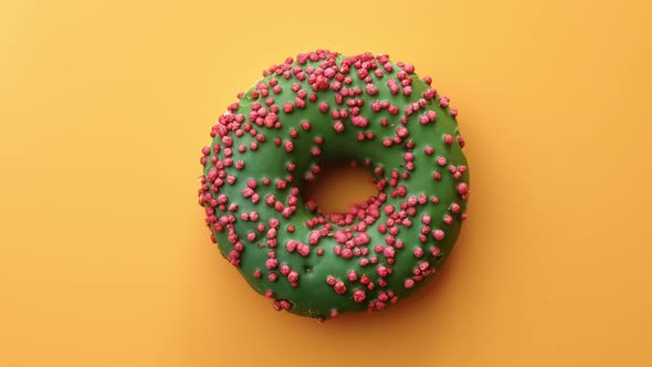 Top View Fresh Dessert Covered By Glazed Green Chocolate Rotating Isolated