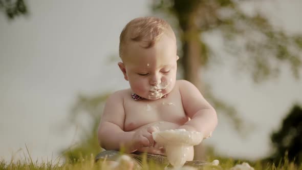 1 Year Birthday Small Child Holding a Ice Creme.