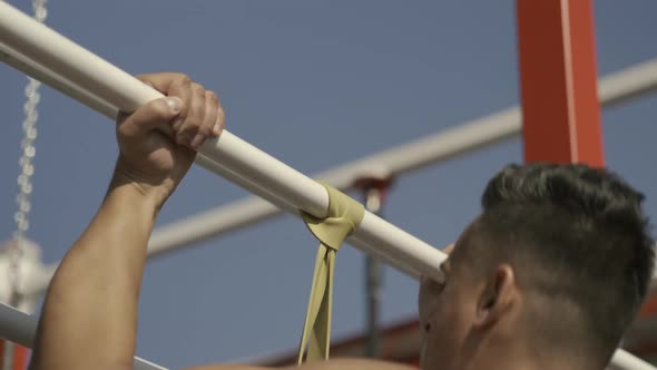 Man Doing Pullups Exercises