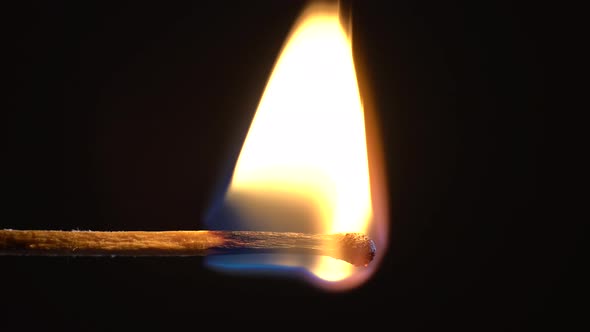 Match Burning in the Dark