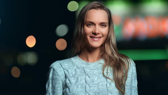 Portrait of Adorable Smiling Female Posing at Evening City