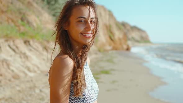 Slow Motion of Happy Joyful Slim Fitbody Woman Wearing in Bikini and Enjoying Wind and Waves on Sea