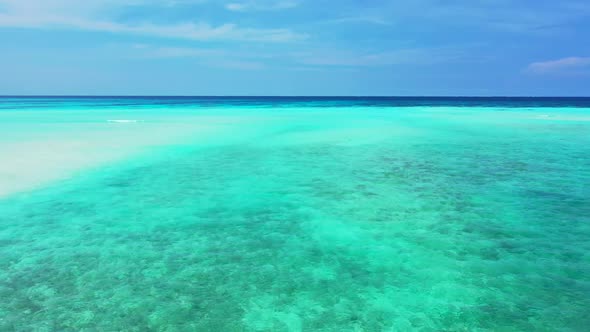 Aerial view texture of exotic tourist beach time by aqua blue ocean with white sandy background of a