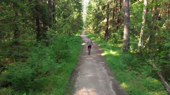 Young Cyclist Riding on a Nice Road