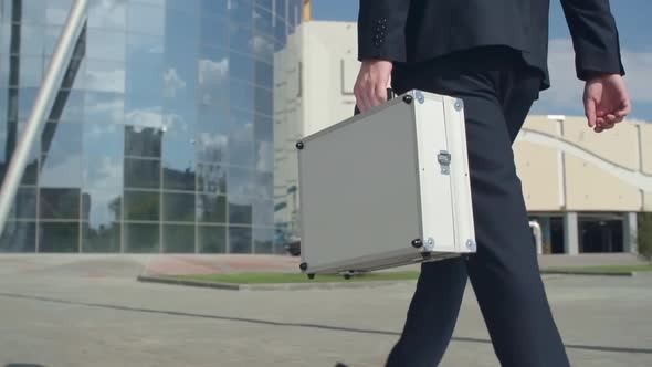 Walking with Briefcase