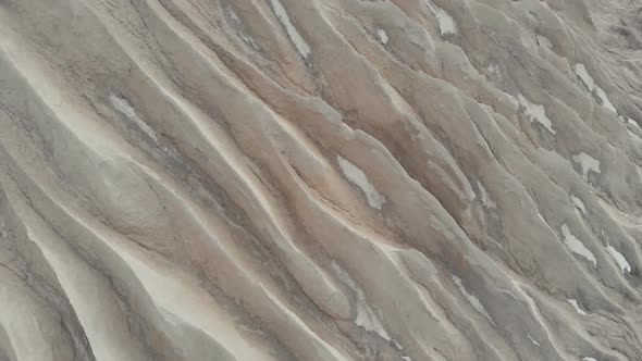 Relief of a Mining Quarry. Barchan. Sand Dune. Spent Mining Quarry. Aerial View 