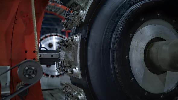 Automated Automobile Tire Production Machine with Rubber Tape at Modern Factory