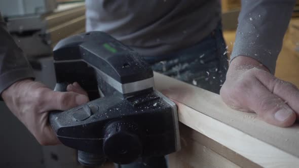 Crop carpenter using wood sander