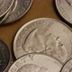 Rotating stock footage shot of American quarters (coin - $0.25) - MONEY 0231 - VideoHive Item for Sale