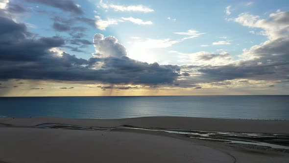 Sand dunes mountains and rain water lagoons at northeast brazilian paradise.