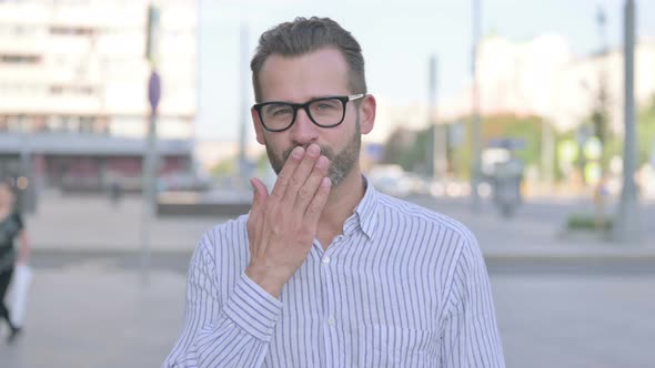 Flying Kiss By Young Adult Man Outdoor