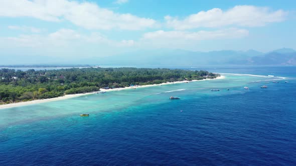 Aerial above texture of luxury coastline beach time by blue green ocean with white sand background o