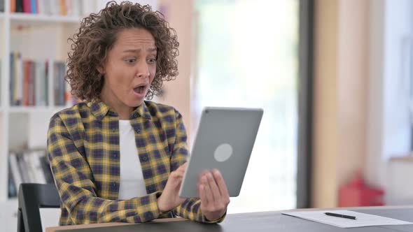 Loss Young Mixed Race Woman Reacting to Failure on Tablet