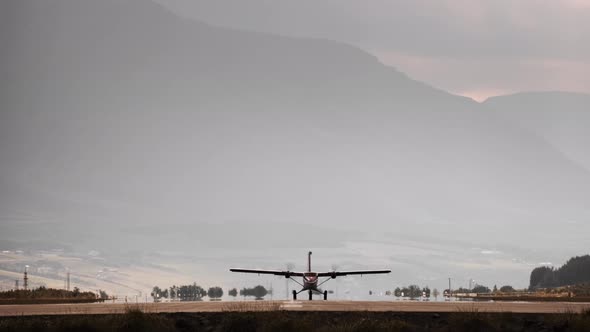 Propellor Airplane Taking Off From Runway