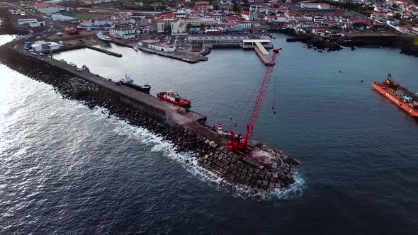 Aerial Shot of Madalena port and Port Crane in Pico Island, Azores. Portugal.