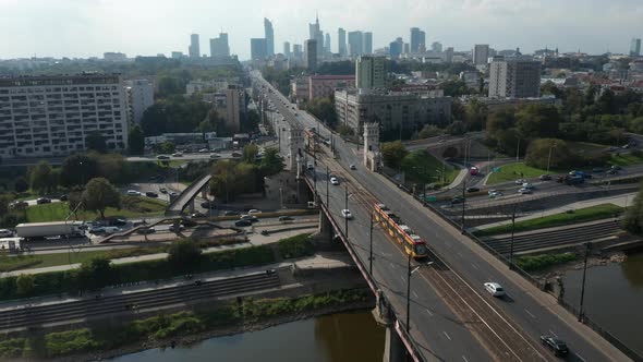 Aerial drone view of the historic Poniatowski Bridge and the center of Warsaw in the background. War