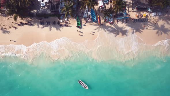 Boat In The Caribbean With Waves And White Sand And Palms Tree Like Paradise 2 4k 24fps.Mp4