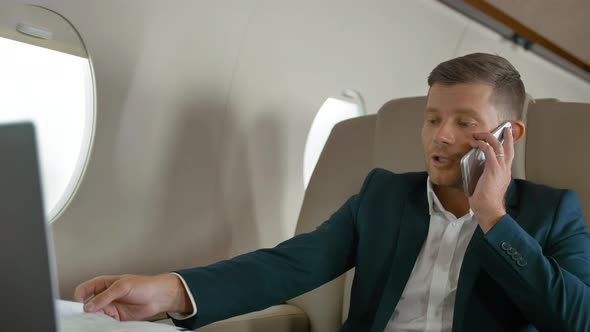 Businessman Talking By Mobile Phone Partner Connection Aircraft Jet Travel