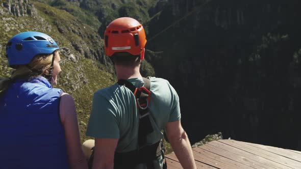 Young Caucasian couple in helmets