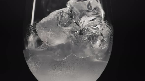 Cold Water Ice Cubes Glass Closeup Zoom on