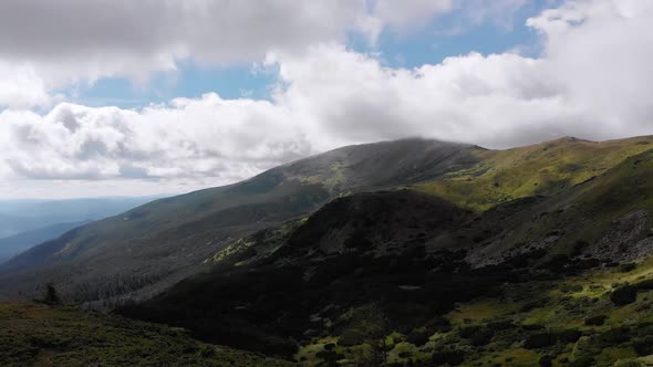 Aerial Panoramic View of Green Mountain Range and Hills in Valley of Carpathian