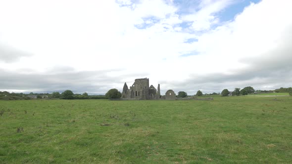 Green field by the Hore Abbey ruins