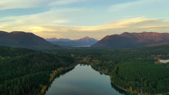 Picturesque View Of June Lake During Sunset In glacier montana. Aerial Wide Shot